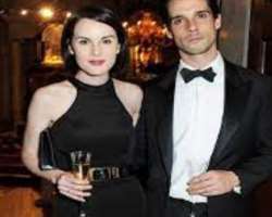 Michelle Dockery consuming alcohol